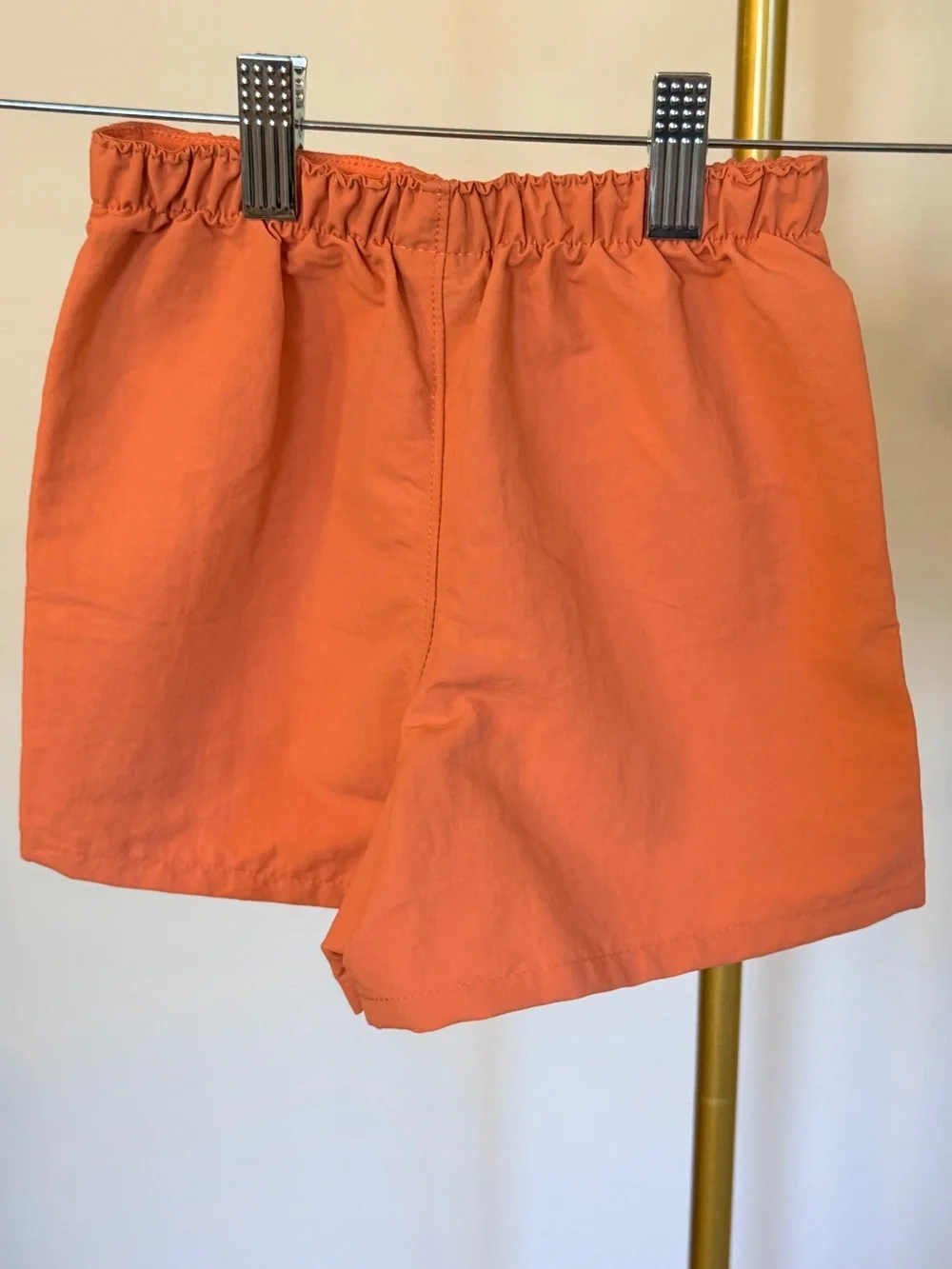 Patagonia Baggies 4” Un-Lined Coral Orange Peel Kids Elastic Waist Shorts